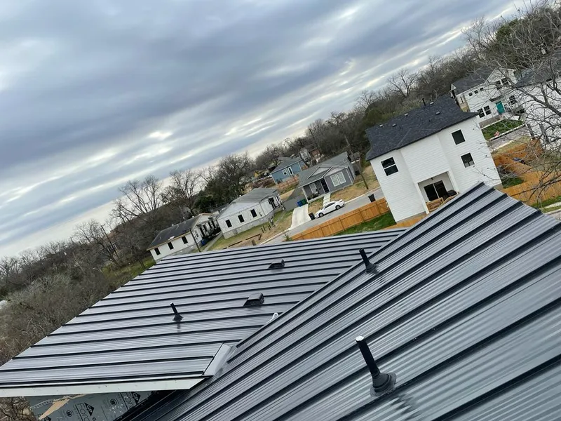 Standing seam metal roof panels with vents for Skylight Repair in Eagleton Village